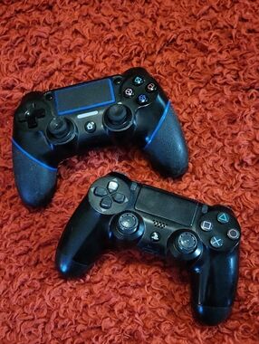 Sony Black Wireless Game Controllers with Blue Trim